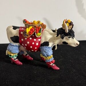 "Tropicowl" from the CowParade collection, which is a retired and rare piece.